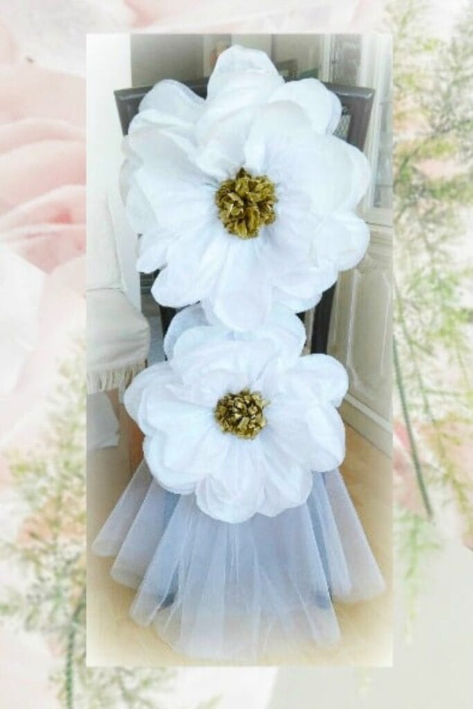 giant white tissue paper flowers on chair back - blooming archives