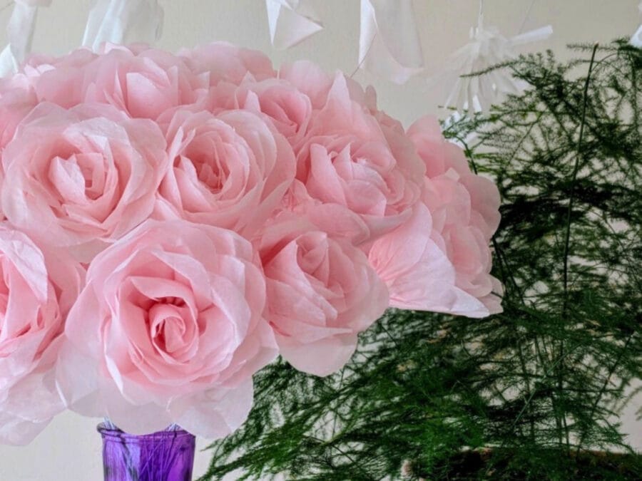 All the flowers in the pink bouquet are made with paper ruffles