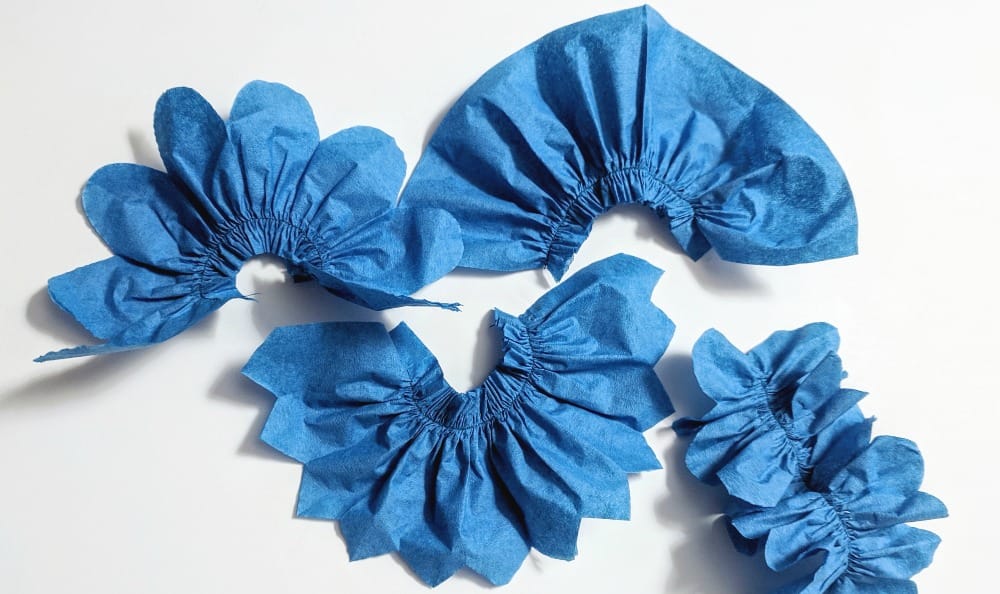 blue paper napkin strips ruffled and cut with varied edges