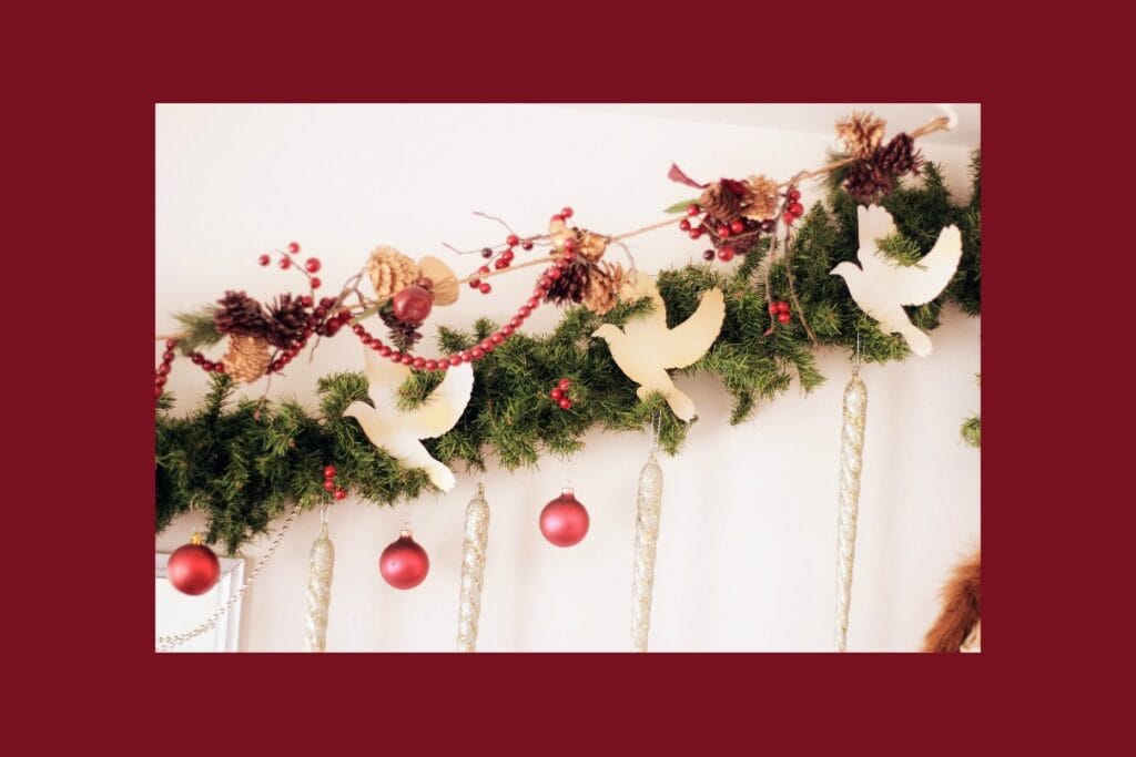 red Christmas decorations and gold parer doves